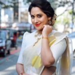 Miya George Instagram - Happy Vishu 🌼 Mua @femy_antony__ Saree @ar_handlooms_kuthampully Jewelry @ezerjewellery Clicks @abinprasad_cherthala Styling @sabarinathk_