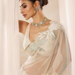 Mouni Roy Instagram – My front row cliché 🤍
#ASareeGirlForever
•
•
•

Dressed in @rohitbalofficial 
Jewels @anmoljewellers 
Rings @narayanjewels 
Styled by @manekaharisinghani 
Hair by @hairbysharda 
Make up by @chettiaralbert 
Shot by @trishasarang