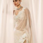 Mouni Roy Instagram - My front row cliché 🤍 #ASareeGirlForever • • • Dressed in @rohitbalofficial Jewels @anmoljewellers Rings @narayanjewels Styled by @manekaharisinghani Hair by @hairbysharda Make up by @chettiaralbert Shot by @trishasarang