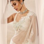 Mouni Roy Instagram – My front row cliché 🤍
#ASareeGirlForever
•
•
•

Dressed in @rohitbalofficial 
Jewels @anmoljewellers 
Rings @narayanjewels 
Styled by @manekaharisinghani 
Hair by @hairbysharda 
Make up by @chettiaralbert 
Shot by @trishasarang