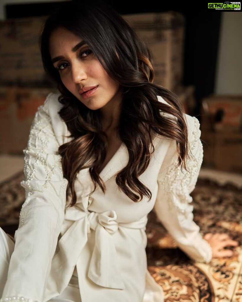 Nikita Dutta Instagram - I want the same confidence in life that I have while wearing white and thinking I won’t dirty it. 👻 🤍 . The stats say 9/10 times I dirty it 🤫 . . . 📸: @saurabh_sonkar HMU: @mitavaswani @rasilaravariamua Styled by @vidyulaa Assisted by @she_bohemian_ Blazer: @themudy.official Trousers: @anjum_khanofficial Earrings: @houseofmitti Shoes: @londonrag_in