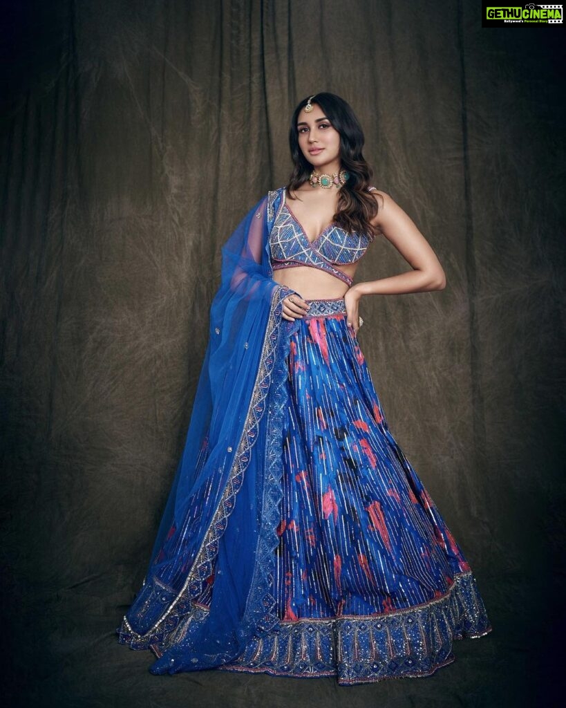Nikita Dutta Instagram - The inside is probably flaming red currently, but outside is a cool blue. 👊💙 . . . . HMU: @mitavaswani Styled by - @vidyulaa Assisted by- she_bohemian_ Shot by - @mandar_studio Lehenga - @laxmishriali Jewellery - @aulerthofficial Ring- @ishhaara @ascend.rohank