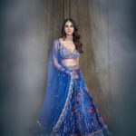 Nikita Dutta Instagram – The inside is probably flaming red currently, but outside is a cool blue. 👊💙
.
.
.
.
HMU: @mitavaswani 
Styled by – @vidyulaa
Assisted by- she_bohemian_
Shot by – @mandar_studio
Lehenga – @laxmishriali
Jewellery – @aulerthofficial
Ring- @ishhaara @ascend.rohank