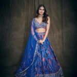 Nikita Dutta Instagram – The inside is probably flaming red currently, but outside is a cool blue. 👊💙
.
.
.
.
HMU: @mitavaswani 
Styled by – @vidyulaa
Assisted by- she_bohemian_
Shot by – @mandar_studio
Lehenga – @laxmishriali
Jewellery – @aulerthofficial
Ring- @ishhaara @ascend.rohank