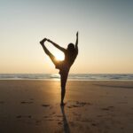 Nikita Dutta Instagram - Wearing gratitude and taking some light from the setting sun. 🌅 🌊 🧘‍♀️ 🌸 . . . . . #Sunset #Yoga #ChakraAsana #BackBends #wheelposevariation #UtthitaHastaPadangusthasana #YogaByTheBeach #Stretch #Photography Palshet Beach