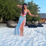 Nikita Dutta Instagram – 🩵🩷
Nothing that a walk on the beach during sunset can’t cure. Provided you balance through that soft sand.
.
.
.
.
.
Outfit by @kairesortwear styled by @jaferalimunshi assisted by @ankitha_chauhan @sr_styleco 
.
📍: @signaturecollectionmaldives @hideawaybeachmaldives @lilytoursmaldives