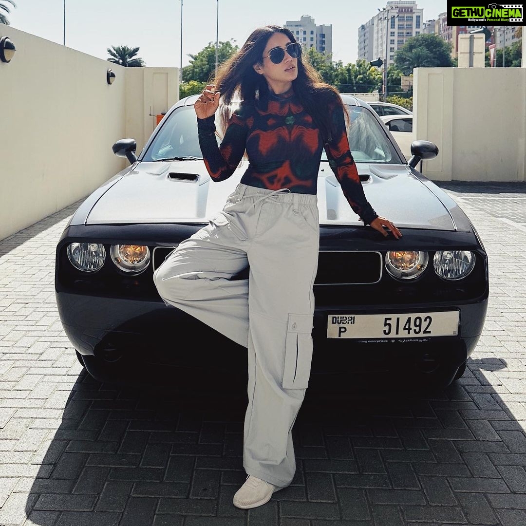 Nivetha Pethuraj Instagram - Together since 2014 #dodgegirl #challenger #musclecar