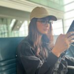Pooja Hegde Instagram - Catching up with 2023.. time to get back to work ✈️📱 #transitreading Dubai, United Arab Emirates
