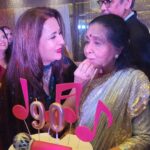 Poonam Dhillon Instagram – 90th Birthday Celebrations are most special… more so when its after performing for a 4 hours Live  concert. It was so special to be present for the Historic ,Monumental Rocking Concert @cocacolaarena & then at Asha ji’s cake cutting @ashasmiddleeast . How loved & Adored you are is incredible. Pray for your good health, long life & tenacity & ability to perform on stage till your 100th Bday. @asha.bhosle Dubai, UAE
