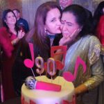 Poonam Dhillon Instagram – 90th Birthday Celebrations are most special… more so when its after performing for a 4 hours Live  concert. It was so special to be present for the Historic ,Monumental Rocking Concert @cocacolaarena & then at Asha ji’s cake cutting @ashasmiddleeast . How loved & Adored you are is incredible. Pray for your good health, long life & tenacity & ability to perform on stage till your 100th Bday. @asha.bhosle Dubai, UAE
