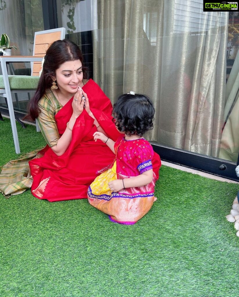 Pranitha Subhash Instagram - Had a Satyanarayana puja at a friends , dressed my little one up , left her in her crib (so she doesn’t make a mess in the meantime) and went into my room to change over. Came back in a few minutes only to find her asleep! Didn’t want to wake her up, So I quickly went by , wished my friend had lunch and came back only to see her rolling around in the balcony in her new langa jacket .. babies and their sleep times.. 🙈 Do my fellow new parents relate ?
