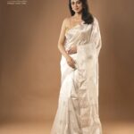 Priyanka Mondal Instagram - Unveiling our first lot of festive PUJA edit: Exquisite handwoven Chanderi silks right from the heart of Chanderi village in Madhya Pradesh, painstakingly woven to perfection by master weavers! This is a pure handwoven white chanderi with lotus motif all over the body! Thanks @priyankamondalofficial for being our muse #chanderi #chanderisilk #saristyle #saris #sarees #handloomsaree #handwovensarees #weavetales