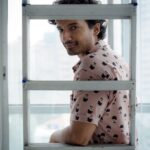 Priyanshu Painyuli Instagram - How do you make a staircase laugh? #monsoonriddle No. 4 😊 Pic by @jaiminacharya03 HMU @sanjibmajumder #photoshoot #chaplinfan #chaplinshirt
