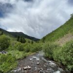 Punarnavi Bhupalam Instagram - We started our 8-day trip to Colorado through a statutory town located in Southwest Colorado at the headwaters of the Rio Grande River called Creede. ‘City of Creede’ is a historic silver mining town nestled in the heart of the San Juan Mountains. From the white settlers banishing Ute and Apache from their land to the rise and fall of silver mines in the 18th century. This mountain town has lived through all the possible drama. While I was strolling through the town I found myself in a 45-year-old gallery of treasures called rare things and that’s where I met Jennifer J. Inge, a jeweller who doesn’t confine herself as just a jeweller but uses jewellery as one facet of her sculptural expression. Jennifer showed me a neckpiece she made with black horse hair, silver and amethyst. I was sold when I saw it and so I wore it upon the mountains every day. Hopefully one day I will pass this on to my next of kin. Have you ever wondered what you will be leaving for your future generation? Creede, Colorado
