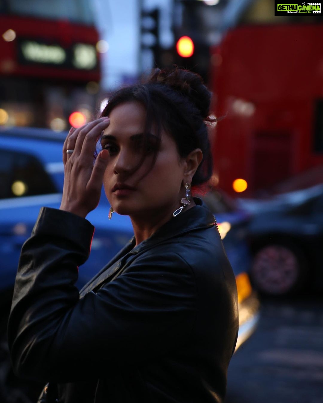 Richa Chadha Instagram - Changed by the gaze šļø Can you control how youāre looked at ? The observer effect in science⦠can a thing be altered merely by how it is looked at? What is a thing, is it really a thing if itās making choices in the moment, is it a choice if itās both a wave of potential and matter itself or state of being. Can you be altered by how someone sees you, yes, if you allow it. Only I know what I am talking about and when I look back to this post, I will blush, because thereās an intimate admission of how the morning started, how sleepless the night was⦠and this repression⦠I will realise that photos from this stroll will simultaneously represent a deeper acknowledgment of power, a seething rage, an amazing curiosity and an exhilaration. This time was weird, but I was alive and stayed so, a bit singed really. This is not a shoot, this is me in my clothes, having dusted some shadow, wearing my beloved blue dress seeking to go out with rainwater in my hair, wrapping a short with complete strangers. Never thought Iād look nice when troubled. Ah well. š· @boomstastudio HMU @glazoschool . . . . . #quatum #dontbeobsessedwithme #work #evolution #truth #taraash