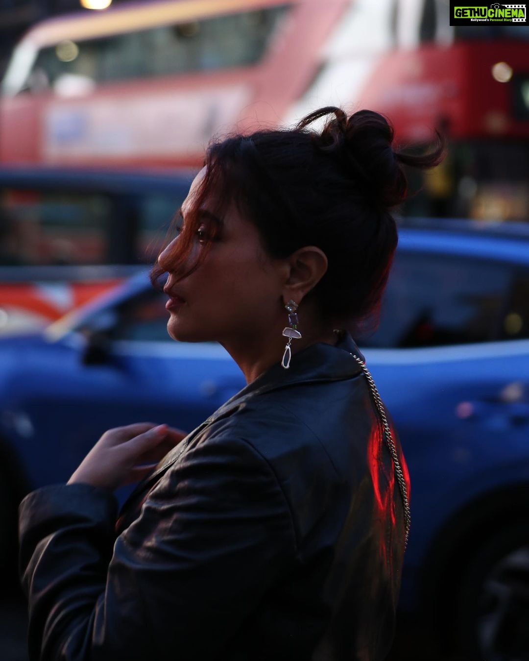Richa Chadha Instagram - Changed by the gaze šļø Can you control how youāre looked at ? The observer effect in science⦠can a thing be altered merely by how it is looked at? What is a thing, is it really a thing if itās making choices in the moment, is it a choice if itās both a wave of potential and matter itself or state of being. Can you be altered by how someone sees you, yes, if you allow it. Only I know what I am talking about and when I look back to this post, I will blush, because thereās an intimate admission of how the morning started, how sleepless the night was⦠and this repression⦠I will realise that photos from this stroll will simultaneously represent a deeper acknowledgment of power, a seething rage, an amazing curiosity and an exhilaration. This time was weird, but I was alive and stayed so, a bit singed really. This is not a shoot, this is me in my clothes, having dusted some shadow, wearing my beloved blue dress seeking to go out with rainwater in my hair, wrapping a short with complete strangers. Never thought Iād look nice when troubled. Ah well. š· @boomstastudio HMU @glazoschool . . . . . #quatum #dontbeobsessedwithme #work #evolution #truth #taraash