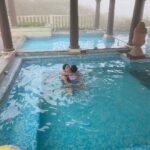 Rucha Hasabnis Instagram - Pool, fog and family. Perfect equation for happiness 💙💦 . . #familytime #love #happiness