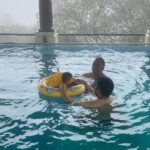 Rucha Hasabnis Instagram - Pool, fog and family. Perfect equation for happiness 💙💦 . . #familytime #love #happiness