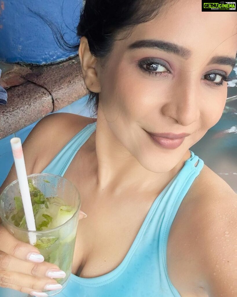 Sakshi Agarwal Instagram - Whats better than rain, pool, ocean and a sip of 🍸 No amount of rain can stop me from getting into the pool💕 . #goabeach #goadiaries #pooltime #rain Taj Holiday Village Resort & Spa Goa