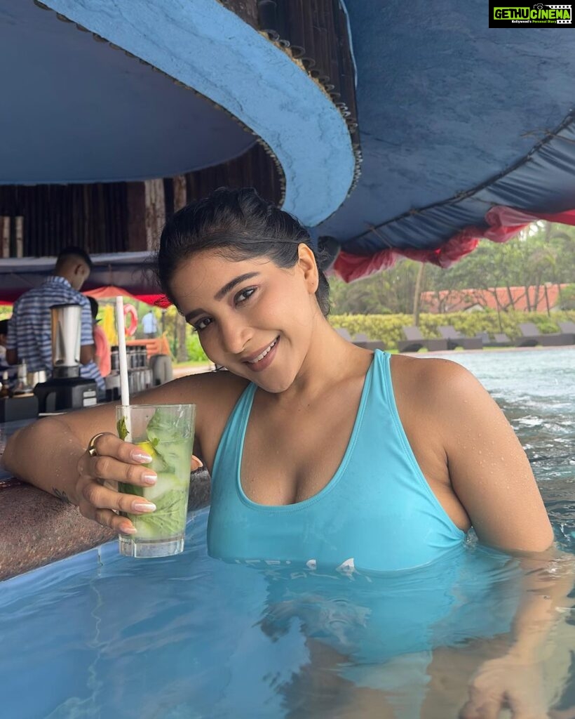 Sakshi Agarwal Instagram - Whats better than rain, pool, ocean and a sip of 🍸 No amount of rain can stop me from getting into the pool💕 . #goabeach #goadiaries #pooltime #rain Taj Holiday Village Resort & Spa Goa