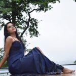 Sangeetha Bhat Instagram - “Let the rain kiss you. Let the rain beat upon your head with silver liquid drops. Let the rain sing you a lullaby.” #sangeethabhat #sangeethabhatsudarshan #monsoonbaby #rainyjuly4th #bluegown #infinitypool #naturelover #natureschild #actress #coorg #gratitude Porcupine Castle Resort, Coorg