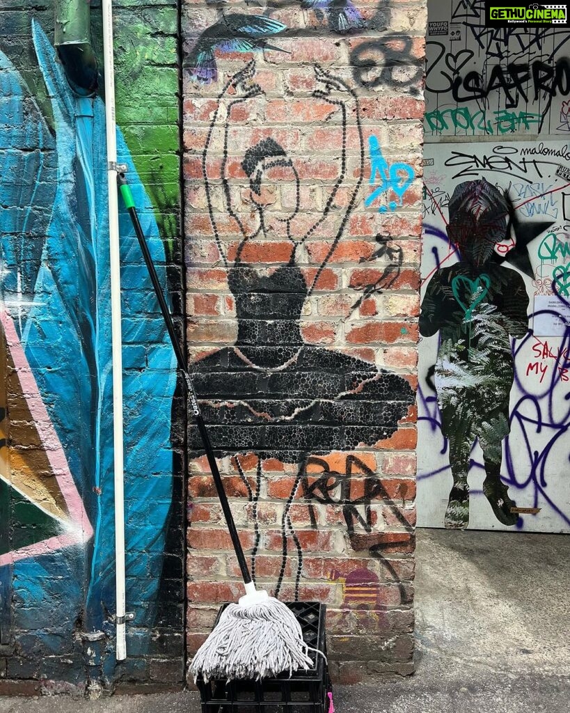 Sayani Gupta Instagram - @onehappytea told me about a real @banksy in Melbourne. Apparently very few people know about it. Most think two other that were there were destroyed & painted over by mistake. So @nitya_h & I set out on a graffiti discovery hunt and finally found itttt. Big thanks to a guide who was showing around two other people didn’t know about it either.. but once we told her, she started looking around the place and spotted it! She said this would be a huge deal for the tourists & locals. As one would imagine with him.. this one was hidden away in the most non assuming corner next to the back door of a restaurant. This alley has some of the best graffitis too. (Fifth photo onwards) I’d seen quite a few @banksy at the @mocomuseum in Amsterdam but this one’s special. We felt quite victorious! @australia #seeauatralia Melbourne, Victoria, Australia