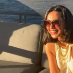 Sayani Gupta Instagram – Meet Audrey & Murray. Both 97.
We met them on the Sunset cruise at Hayman. We noticed them &@smritikiran expressed how cute they were. As the 🛥️ took off I couldn’t help go say hi. And the rest is History.

So A&M went to school together since they were 4..when he would carry her books for her. They were friends.. (I asked if Murray had a crush on Audrey to which she quickly quipped & said Oh YES!) she knew he liked her and of course there was an understanding.
After school and beginning of collage Murray had to go for the War(WWll), he was in the navy. While he was away.. Audrey got married to another man. He came back after the war and married someone else too. They both had children with their respective partners. But kept in touch.Later they both lost their partners.
One day Audrey was coming out of her house and a bike came and stood in front of her. On it was a man with 🪖& 🕶️ . She couldn’t see his face & told him why he would stop in front of her this way. As he took out his helmet, he said.. ‘Audrey, you don’t recognise me? It’s Murray!’
She couldn’t believe her eyes. They rekindled their friendship. And sometime later Murray moved in with her. They started dating 6 years ago and got married one and half years ago. Now they live in her house (not his mansion) &travel together. While Murray struggles to remember things (Audrey is sharp), She struggles to walk (Murray wheels her around). It’s the perfect Companionship.

I told her how fitting her name was.. Audrey (like Hepburn)! 

She said ‘You have beautiful hair’. 
To which Murray added.. ‘Oh Darling! Just the hair! I am sitting here wondering how many marriage proposals she would get in a day!’
Audrey and I slightly choked!😂

As we spoke about other worldly things like kids & disappointments & ailments & coral reefs.. Audrey asked me if I were married & had children.. I told her I wasn’t.
So she held both my hands and said.. ‘here’s to finding Mr.Right!’ (Now from their story Mr.R may come when I am 90.. who knows). But as the Sun went down & I had made new friends.. I was reminded of how unexpectedly beautiful life turns out if you let it perhaps!

A&M is now, my fav love story. 
🤍🤍