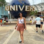 Shraddha Srinath Instagram – Went to an amusement park after what felt like a a hundred years. Jolly. Went on the Mummy ride and screamed out “MUMMMYYYYY” and instantly realised the humour in it. Went for a very nice Peranakan cuisine dinner. Exquisite. Ate so much street food. Tried a bite of durian mousse too. I’ve now joined the anti durian forces. Went for three days of the grand prix. Unforgettable. It was hot and a lot of beer was consumed. I forgot my sunglasses back in India so I had to buy an overpriced merch cap and picked the F1 logo cap because that’s as non committal as it gets. Hey, I’m here for the sport. A girl is allowed to take her time to pick a team no? I want to marry @danielricciardo though. The stories of my love for him are famous. There was beer on the rainy days too, did I mention? Speaking of the rain, the devil himself descended upon us in the form of torrential rains ooooffff. Everyone was wearing white shoes and everyone went home weeping. People were falling all over the place thanks to the slush. I WATCHED @westlife LIVE! Those who do not share my enthusiasm for Westlife can please go stand in one corner. Teenage Shraddha is beaming. I watched the Black eyed peas too but Westlife is what made me so happy. The last picture of me standing under that warning sign is so funny. I laughed and laughed and laughed. Sunscreen was worn on all the days. This is my Singapore dump. Thank you for reading this far.