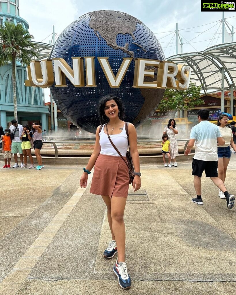 Shraddha Srinath Instagram - Went to an amusement park after what felt like a a hundred years. Jolly. Went on the Mummy ride and screamed out "MUMMMYYYYY” and instantly realised the humour in it. Went for a very nice Peranakan cuisine dinner. Exquisite. Ate so much street food. Tried a bite of durian mousse too. I've now joined the anti durian forces. Went for three days of the grand prix. Unforgettable. It was hot and a lot of beer was consumed. I forgot my sunglasses back in India so I had to buy an overpriced merch cap and picked the F1 logo cap because that's as non committal as it gets. Hey, I'm here for the sport. A girl is allowed to take her time to pick a team no? I want to marry @danielricciardo though. The stories of my love for him are famous. There was beer on the rainy days too, did I mention? Speaking of the rain, the devil himself descended upon us in the form of torrential rains ooooffff. Everyone was wearing white shoes and everyone went home weeping. People were falling all over the place thanks to the slush. I WATCHED @westlife LIVE! Those who do not share my enthusiasm for Westlife can please go stand in one corner. Teenage Shraddha is beaming. I watched the Black eyed peas too but Westlife is what made me so happy. The last picture of me standing under that warning sign is so funny. I laughed and laughed and laughed. Sunscreen was worn on all the days. This is my Singapore dump. Thank you for reading this far.