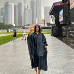 Shraddha Srinath Instagram – Went to an amusement park after what felt like a a hundred years. Jolly. Went on the Mummy ride and screamed out “MUMMMYYYYY” and instantly realised the humour in it. Went for a very nice Peranakan cuisine dinner. Exquisite. Ate so much street food. Tried a bite of durian mousse too. I’ve now joined the anti durian forces. Went for three days of the grand prix. Unforgettable. It was hot and a lot of beer was consumed. I forgot my sunglasses back in India so I had to buy an overpriced merch cap and picked the F1 logo cap because that’s as non committal as it gets. Hey, I’m here for the sport. A girl is allowed to take her time to pick a team no? I want to marry @danielricciardo though. The stories of my love for him are famous. There was beer on the rainy days too, did I mention? Speaking of the rain, the devil himself descended upon us in the form of torrential rains ooooffff. Everyone was wearing white shoes and everyone went home weeping. People were falling all over the place thanks to the slush. I WATCHED @westlife LIVE! Those who do not share my enthusiasm for Westlife can please go stand in one corner. Teenage Shraddha is beaming. I watched the Black eyed peas too but Westlife is what made me so happy. The last picture of me standing under that warning sign is so funny. I laughed and laughed and laughed. Sunscreen was worn on all the days. This is my Singapore dump. Thank you for reading this far.