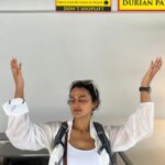 Shraddha Srinath Instagram – Went to an amusement park after what felt like a a hundred years. Jolly. Went on the Mummy ride and screamed out “MUMMMYYYYY” and instantly realised the humour in it. Went for a very nice Peranakan cuisine dinner. Exquisite. Ate so much street food. Tried a bite of durian mousse too. I’ve now joined the anti durian forces. Went for three days of the grand prix. Unforgettable. It was hot and a lot of beer was consumed. I forgot my sunglasses back in India so I had to buy an overpriced merch cap and picked the F1 logo cap because that’s as non committal as it gets. Hey, I’m here for the sport. A girl is allowed to take her time to pick a team no? I want to marry @danielricciardo though. The stories of my love for him are famous. There was beer on the rainy days too, did I mention? Speaking of the rain, the devil himself descended upon us in the form of torrential rains ooooffff. Everyone was wearing white shoes and everyone went home weeping. People were falling all over the place thanks to the slush. I WATCHED @westlife LIVE! Those who do not share my enthusiasm for Westlife can please go stand in one corner. Teenage Shraddha is beaming. I watched the Black eyed peas too but Westlife is what made me so happy. The last picture of me standing under that warning sign is so funny. I laughed and laughed and laughed. Sunscreen was worn on all the days. This is my Singapore dump. Thank you for reading this far.