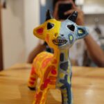 Sobhita Dhulipala Instagram - Please say hi to this cutie. Got him from the set of MIH S1 in 2017! I had even named him Rubaab. Lol Originally a white (and black dotted) paper mache goat/lamb, the fellow’s been given a nice makeover from painter @vikikistudio. Thanks for the colour and thanks for the teeth! She said she was inspired by my Gemini-ness and so, gave him a 2-in-1 personality 😛