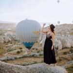 Sonalee Kulkarni Instagram - ज़रा 🎩 के …. Photoshoot by @mervekansuphotographer #sonaleekulkarni #cappadocia #kapadokya #turkey #photo #hotairballoon #photography #black #dress #hat #rocks #birthdaypact #birthdaytrip Göreme, Cappadocia