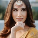 Sonnalli Seygall Instagram - Colour me happy 🧡 Photograph: @the_wedding_files Outfit: @abhinavmishra_ Earrings and maatha patti: @koharbykanika Juttis: @juttichoo Makeup: @saniya.advani Hair: @pinky_viswakarma Styled by: @trishadjani