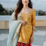 Sonnalli Seygall Instagram - Colour me happy 🧡 Photograph: @the_wedding_files Outfit: @abhinavmishra_ Earrings and maatha patti: @koharbykanika Juttis: @juttichoo Makeup: @saniya.advani Hair: @pinky_viswakarma Styled by: @trishadjani