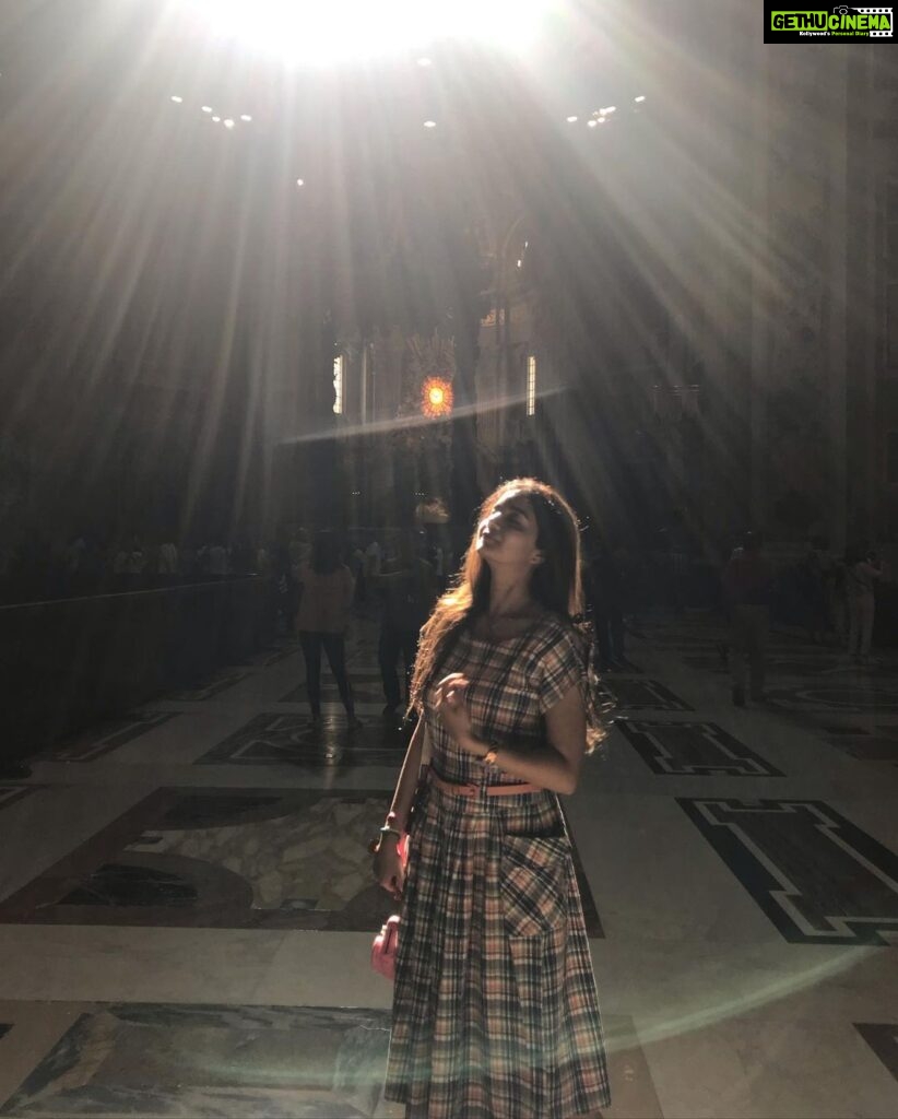 Swathi Reddy Instagram - These pics are not edited. That’s the setting sun shining through the gorgeous glass ceilings. Visiting the St. Peter's Basilica was an overwhelming experience. I was standing there in awe of the place, the power it holds and noticing the faces of the light Sunday crowd when I heard her say, “Don’t move, don’t move, I have to capture this”. Got lucky and posed. Back to the faces..everybody is struggling. The ones you know and the ones you don’t. Now that is a deeply understated bond we all share. Vatican City, Vatican City