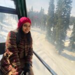 Tanvi Ram Instagram - Missing fdfs of my movie today but eagerly waiting for everyone to watch the movie and let us know your reviews♥️ #enkilumchandrike #tanviram #gulmarg #kashmir #travel Attire - @zawe.calicut Gulmarg Cable Car