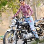 Aditi Prabhudeva Instagram - 😜Not only for boys but a bike is also crush for many girls too 🏍 . . #throwback #bikelove #champion Designer: @laxmikrishnaofficial