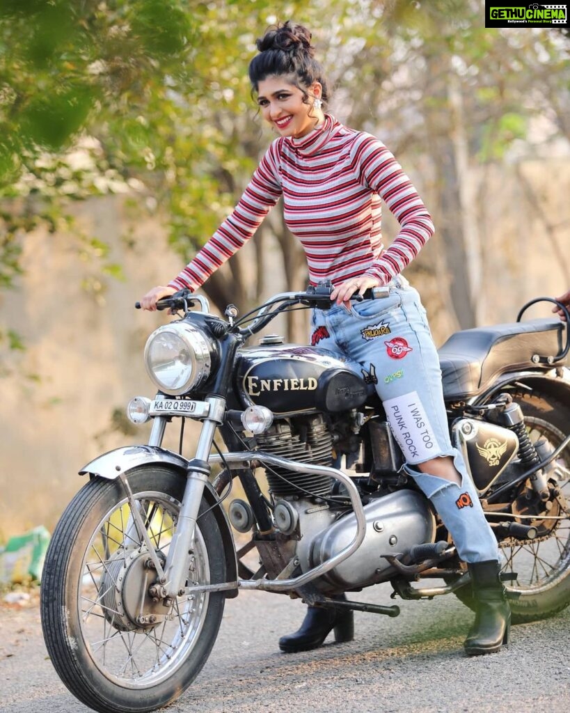 Aditi Prabhudeva Instagram - 😜Not only for boys but a bike is also crush for many girls too 🏍 . . #throwback #bikelove #champion Designer: @laxmikrishnaofficial