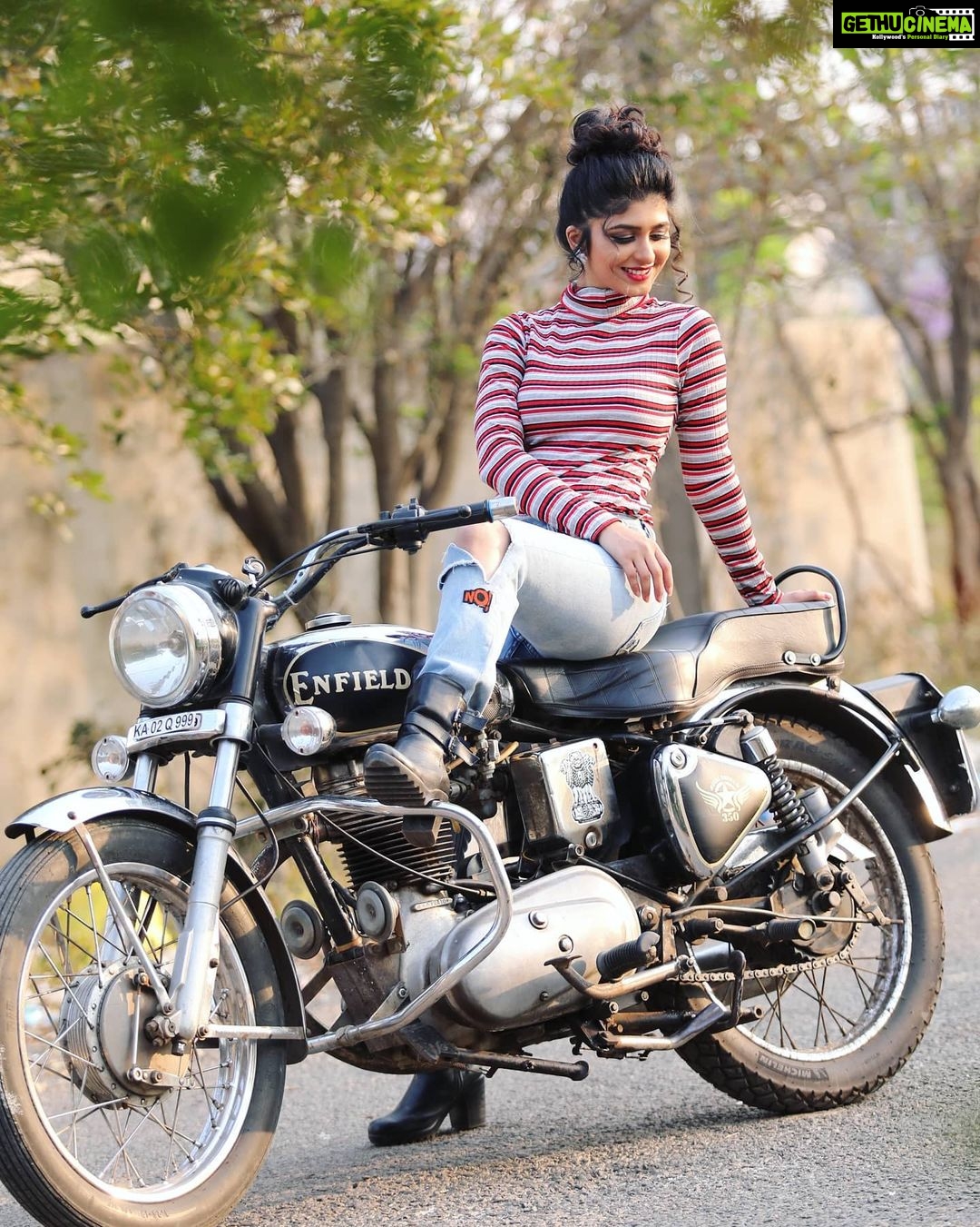 Aditi Prabhudeva Instagram - 😜Not only for boys but a bike is also crush for many girls too 🏍 . . #throwback #bikelove #champion Designer: @laxmikrishnaofficial