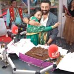 Ameesha Patel Instagram - DUBAI.——Posted @withregram • @city1016 Celebrated the success of Gadar 2 with our very own Tara Singh and Sakina! ❤️ Gadar 2 crosses 300 CRS and we had the pleasure of announcing this live on air with the amazing @iamsunnydeol and @ameeshapatel9 City1016 is the Official Radio Partner of the success of Gadar 2! Watch this space for more! #gadar2 #explorepage #bollywood