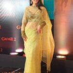 Ameesha Patel Instagram - Posted @withregram • @yogenshah_s #ameeshapatel at #gadar2 success party. Distributing sweets to media. SAKINA dressed by @rockystarofficial @rockystar100 Glam by @jaywantthakre Hair by @poojaudeshihairdesigns
