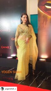 Ameesha Patel Instagram - Posted @withregram • @yogenshah_s #ameeshapatel at #gadar2 success party.
Distributing sweets to media.

SAKINA dressed by @rockystarofficial @rockystar100 
Glam by @jaywantthakre 
Hair by @poojaudeshihairdesigns