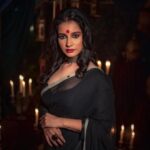 Angana Roy Instagram - In a black saree, I find my inner mystery. #wednesday #postoftheday #sareelove #sareestory #blacksaree #mystery #indianattire #indianlook #lookbook #bindilove #setdesign #aesthetic #kohleyes #anganaroy Melrose Gardens