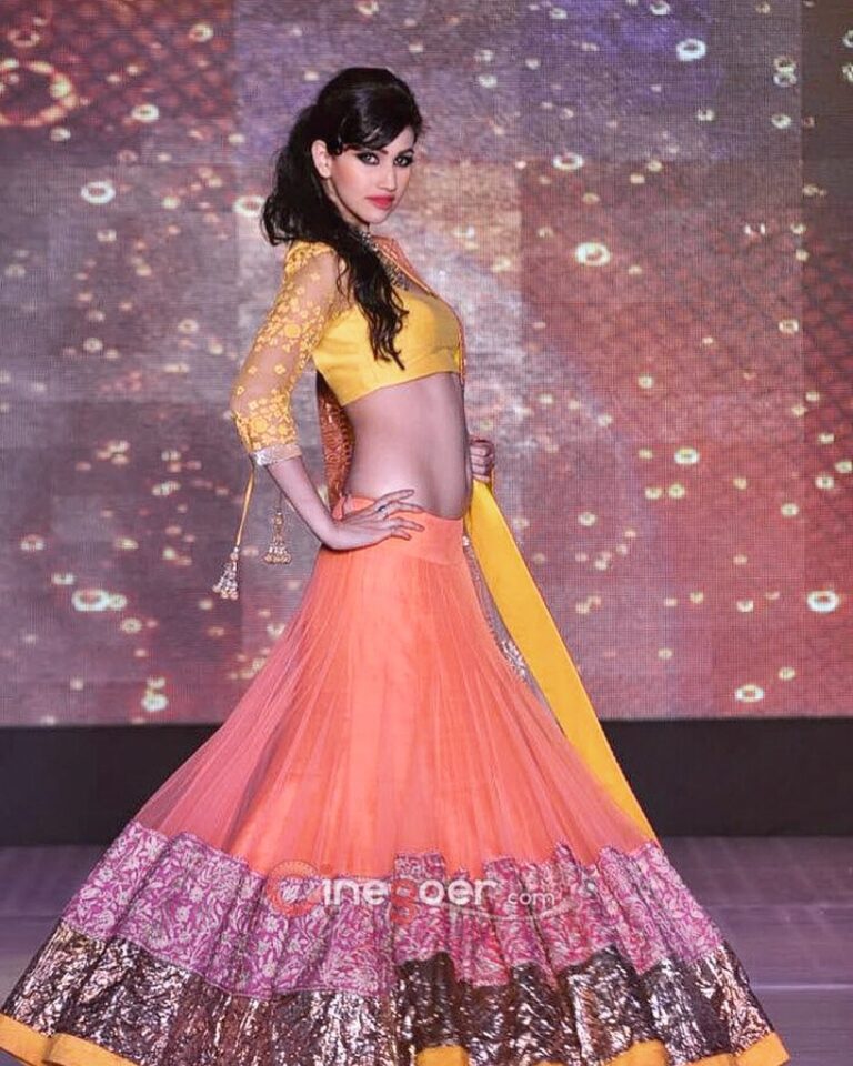 Anjali Lavania Instagram - A playful path is the shortest way to happiness - It’s never too late to have a happy childhood - ask me I am part child part adult 😋🥳 Which song comes to your mind ? #playful #anjalilavania #fun #twirl #swirl #modellife #runway #manishmalhotra #tb #mumbai #indianfood