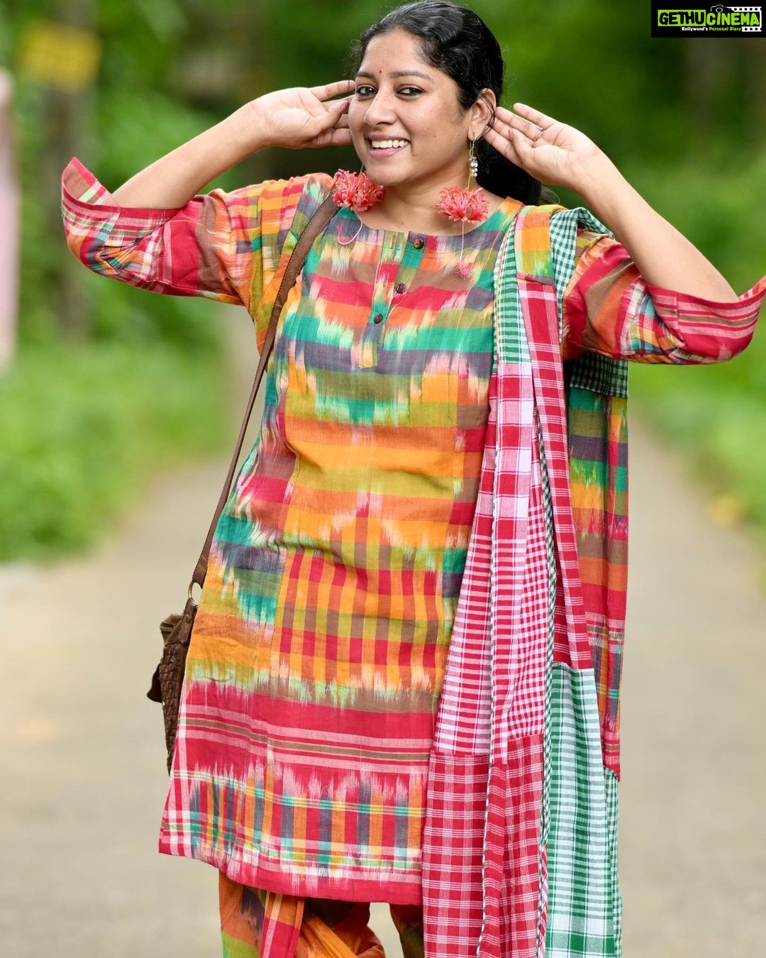 Anumol Instagram - My next look from @145east ’s Onam look book... 🌼🌈 I know the trend leans toward Kerala Kasavu sarees for Onam these days, but I remember when colorful dresses were all the rage, at least for me, about 5-6 years ago! 💃 Here's another stunning multicoloured set from 145East, The entire set comes with a tunic, dhoti pants and a dupatta made out of different gamchas all coming together that makes it look like a piece that you’ll not see anywhere else and it's super comfy too. Don't forget to use my code ANUMOL15 for a 15% discount on this dress. 🛍️✨ ( ചെവിയിൽ ചെമ്പരത്തി വെക്കണ്ട ആവസ്ഥ ആയില്ല ട്ടോ ) #Anumol #AnuYathra #OnamLook #ColorfulOnam #145EastFashion #ComfyStyle #DiscountCode #ANUMOL15 Rayiranellur,Naduvattam