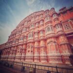 Anupama Gowda Instagram - Jaipur🌸 1. Nahargarh Fort A perfect example of Indo-European architecture. Fort was built as the defence of the capital but was never attacked. Later Maharaja Sawai Jai Singh extended this as retreat place. Fort has nine similar suits constructed for each of the nine queens of Sawai Madho Singh. All these suits are connected to each other by corridors. And also the main part if Nahargarh fort is two-stepwells, the bigger and more attractive one is Nahargarh Baori ( was built to conserve rainwater) is just outside the main fort (Picture No.4) One of India’s most aesthetically pleasing stepwells but maintained so bad ( as tourists it’s also our duty to keep it clean) Entry fees- 50/- 2. Hawa Mahal This mahal is 200 years old and known for its unique architecture with 953 tiny windows 🪟 During those days, the Purdah system was strictly followed and Royal Rajpur women weren’t allowed to show their face to strangers or even appear in public. And, 953 windows which enabled them to get a glimpse of the day-to-day activities and festivities happening on the street below without appearing in public. Entry fees - 50/- #travelwithnu💗 Travelling partner: @zipntrip_travel_solutions Pc: Mr.Raju (Security guard from Nahargarh fort) Hawamahal