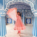 Anupama Gowda Instagram - Jaipur 🌸 1. City palace Every inch of this palace is mesmerising 💓 Love it Love it Love it ! Made of red and pink sandstone , antique artwork and intricate details. To this day, City palace is home to the present royal family of Jaipur. I took City palace Royal tour (3,000/- per person ) where I got the access to visit the upper floors of Chandra Mahal with private guide and in the end complimentary Chai with cookies. 1st floor - Maharaja Sawai Man Singh || Museum. 2nd floor - Sukh Niwas / Blue room. 3rd and 4th floors - Mirror Room and Shobha Niwas. 2. Patrika Gate One of the beautiful locations of Jaipur,it was built to showcase the architectural and cultural heritage of all the regions of Rajasthan. It will be crowded after 10:30 so plan to visit this place around 9 to get some amazing pictures and to enjoy the view. (No entry fees) #travelwithnu💗 Travelling partner: @zipntrip_travel_solutions PC : My tour guide Mr. Rajvendrisingh 🙏🏻 PS: Who clicks your pictures when you go on a solo?? Well, I shamelessly ask everyone to click my pictures and this time I did click few pictures with them too , so swipe left to see my photographer 🤷🏻‍♀️ jaipur,rajesthan