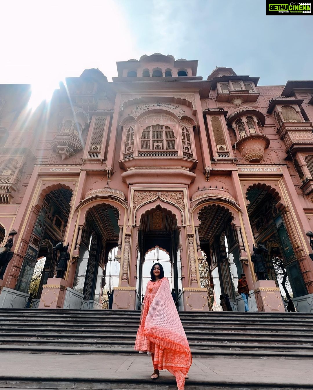 Anupama Gowda Instagram - Jaipur 🌸 1. City palace Every inch of this palace is mesmerising 💓 Love it Love it Love it ! Made of red and pink sandstone , antique artwork and intricate details. To this day, City palace is home to the present royal family of Jaipur. I took City palace Royal tour (3,000/- per person ) where I got the access to visit the upper floors of Chandra Mahal with private guide and in the end complimentary Chai with cookies. 1st floor - Maharaja Sawai Man Singh || Museum. 2nd floor - Sukh Niwas / Blue room. 3rd and 4th floors - Mirror Room and Shobha Niwas. 2. Patrika Gate One of the beautiful locations of Jaipur,it was built to showcase the architectural and cultural heritage of all the regions of Rajasthan. It will be crowded after 10:30 so plan to visit this place around 9 to get some amazing pictures and to enjoy the view. (No entry fees) #travelwithnu💗 Travelling partner: @zipntrip_travel_solutions PC : My tour guide Mr. Rajvendrisingh 🙏🏻 PS: Who clicks your pictures when you go on a solo?? Well, I shamelessly ask everyone to click my pictures and this time I did click few pictures with them too , so swipe left to see my photographer 🤷🏻♀️ jaipur,rajesthan