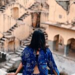 Anupama Gowda Instagram - JAIPUR 🌸 Travelled solo again to this beautiful city Jaipur also known as The Pink City💓 It is filled with stunning forts and palaces, gardens, shopping bazaars. My first visit was to PANNA MEENA KA KUND. Panna Meena ka Kund is a square-shaped stepwell, with adjoining stairs on all four sides and a room on the northern wall. It’s believed this room was used for religious ceremonies before weddings or on popular festival dates. The purpose of creating this stepwell was to harvest and store water of the ‘monsoon’ rains. The stunning pale yellow Panna Meena ka Kund stepwell was built in the 16th century during the reign of Maharaja Jai Singh. And, There is not entry fees. Travelling partner : @zipntrip_travel_solutions Outfit: @myntra #travelwithnu💗 #solotraveler Panna Meena Ka Kund